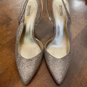 Michael Kora pumps 8.5